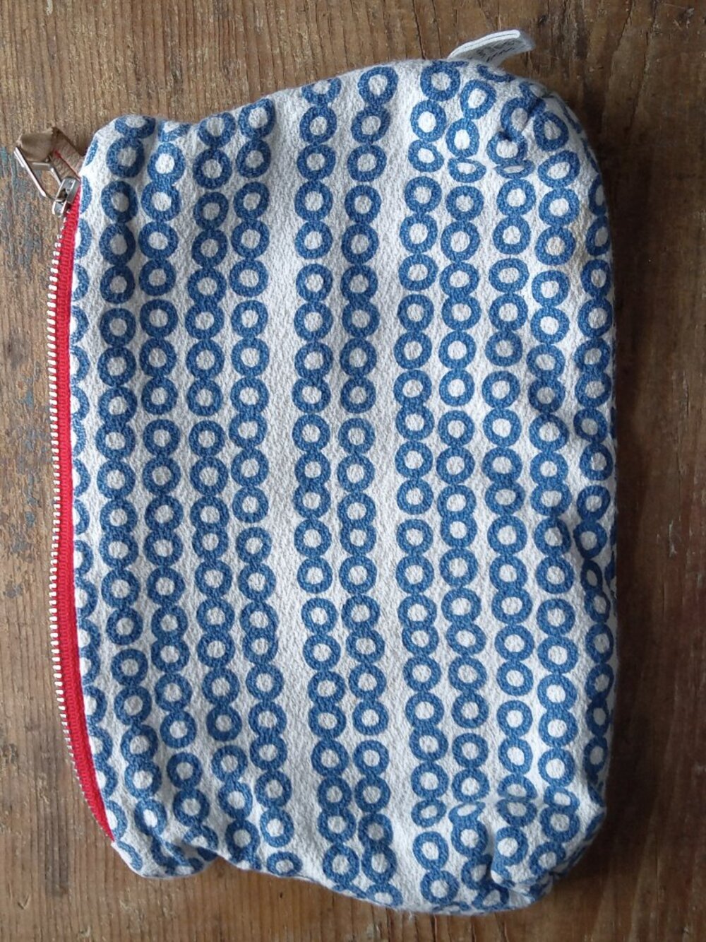 Erin Flett makeup bag or dopp kit.